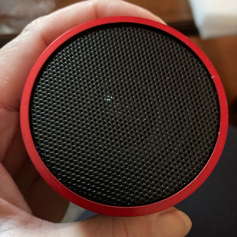 Mini New Red Blue tooth speaker. Instructions and cord included .